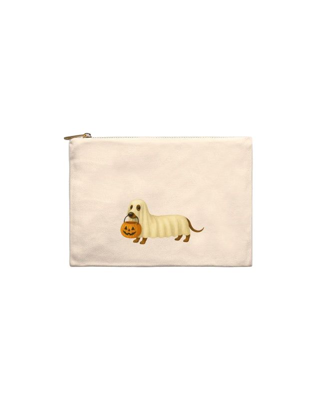 Beige pouch with a dog and pumpkin design on a light gray background