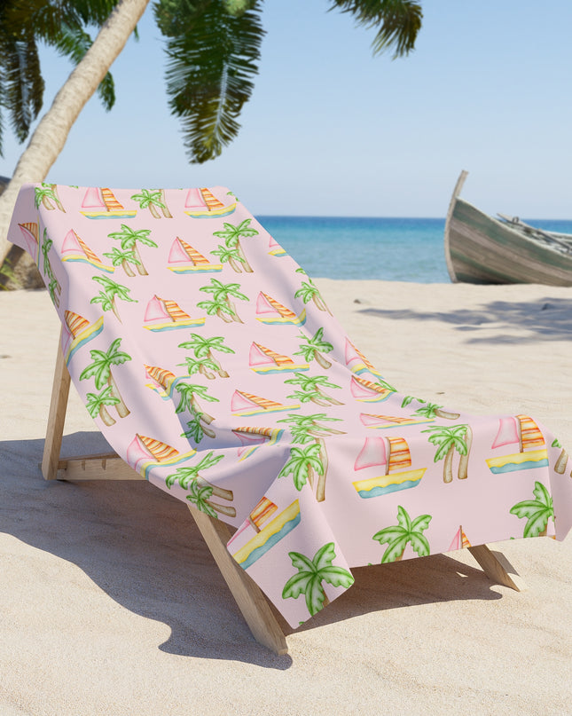 Customizable pink beach towel featuring pink sailboats, green palm trees, and your pet’s face with 'Stay Wild,' available in regular and oversized sizes.