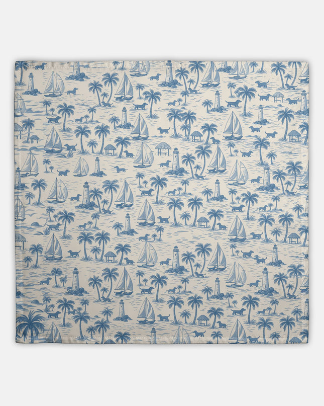 Coastal dachshund hostess towel with blue toile pattern and palm trees