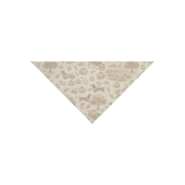 Triangle-shaped fabric with a pattern of dachshunds and trees on a white background