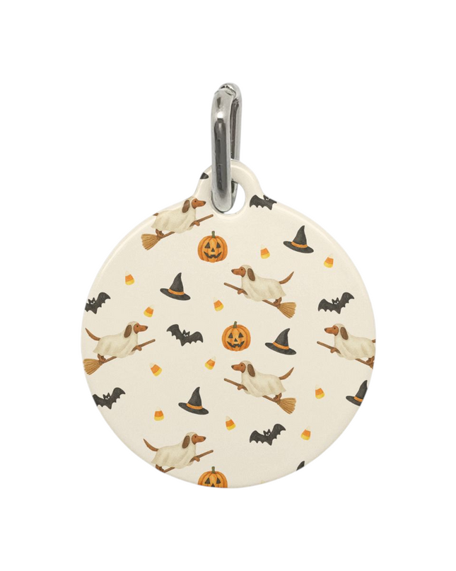 Halloween dachshund dog tag with flying doxies on broomsticks, pumpkins, bats, and candy corn