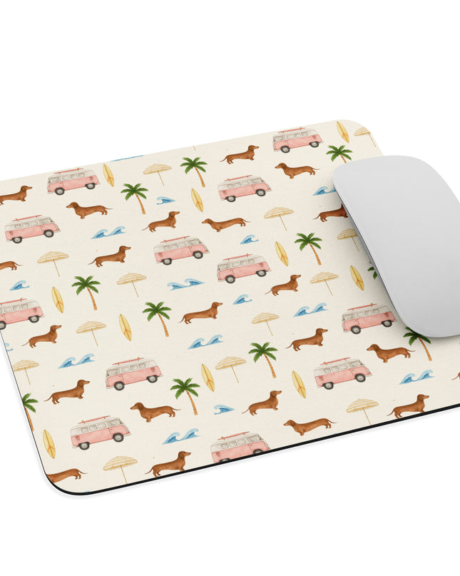 Mouse resting on dachshund print mouse pad with anti-slip rubber backing and beach-themed design