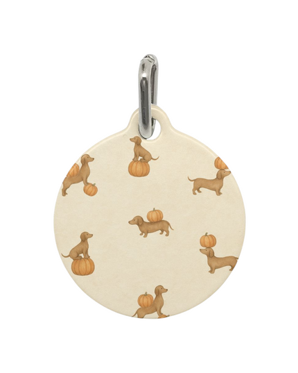 Wiener dog tag with playful dachshunds balancing pumpkins, fall doxie lover accessory